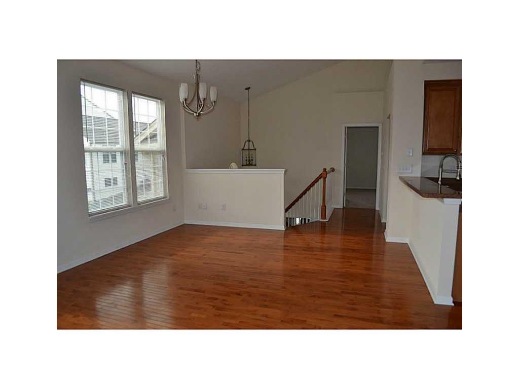 Top Floor, Living Room/Family Room. View-Facing Entrance and Master Bedroom. - 12668 Hollice Ln