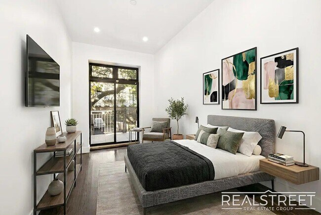 Building Photo - Modern Bushwick 2-bedroom, 2.5-bath duplex with private garden, deck, and finished recreation room —