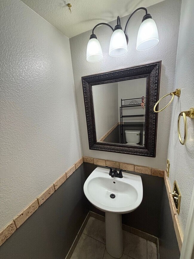 Building Photo - Gated Green Valley Ranch Townhome | 2 Bed | 2.5 Bath | 2-Car Garage