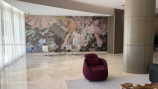 Building Photo - 10275 Collins Ave