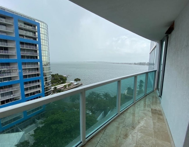 Building Photo - Furnished 1BR Condo with Stunning Bay View...