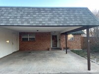 Building Photo - 2 bedroom duplex!  2 bath, 2 car carport
