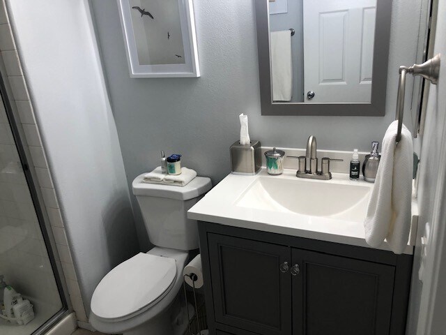 Guest bathrrom with walk in shower - 3845 Wiggins Bay St