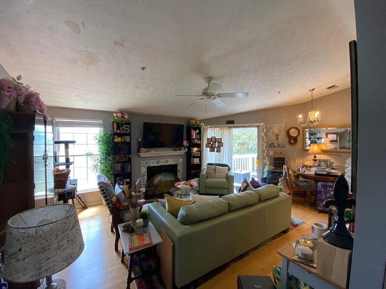 View of the living room from the front door; ample light from sliding door - 1483 Keys Crossing Dr NE