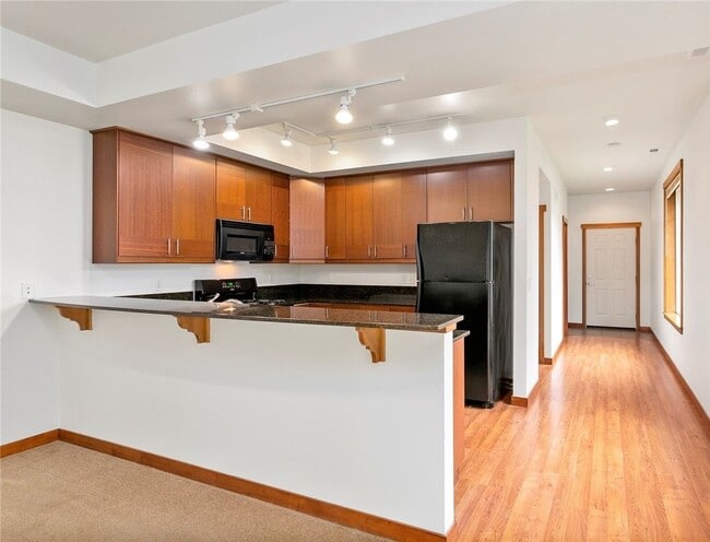 Building Photo - Spacious 3-Bedroom Condo/Townhome in Peaceful Cordata Neighborhood