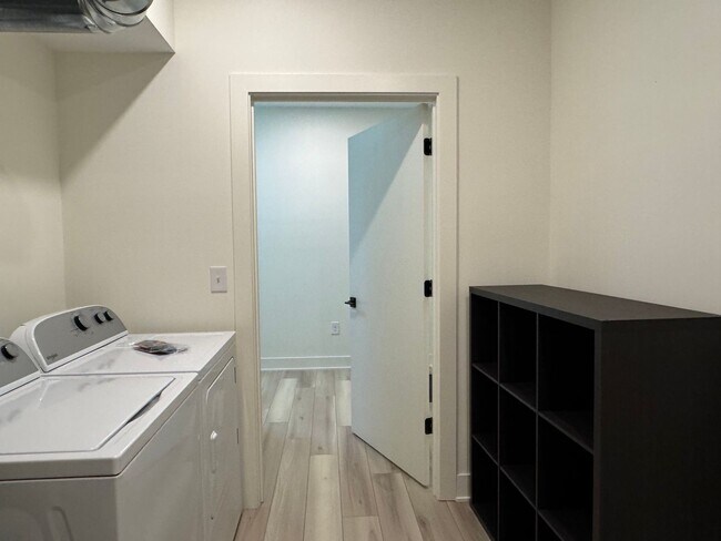 Building Photo - Vaulted Ceilings & Hardwood Floors in This Charming Indianapolis L
