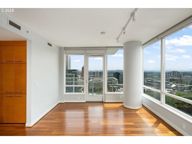 Building Photo - Modern 2-Bed/2-Bath Condo with Balcony & Prime Downtown Location