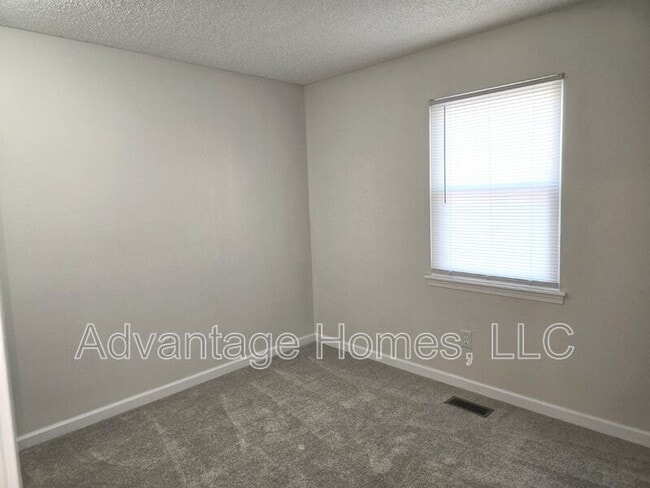 Building Photo - 8206 Woodson Dr
