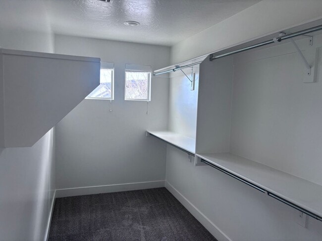 Building Photo - 4bd | 2.5 Bath | 2 Car Detached Desert Canyon Townhome Now Available