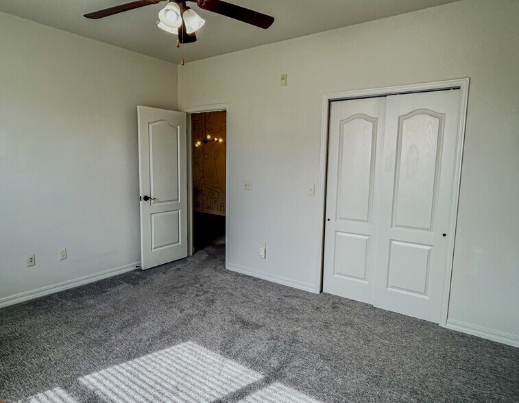 Main level bedroom - 5378 Palomino Ranch Pt
