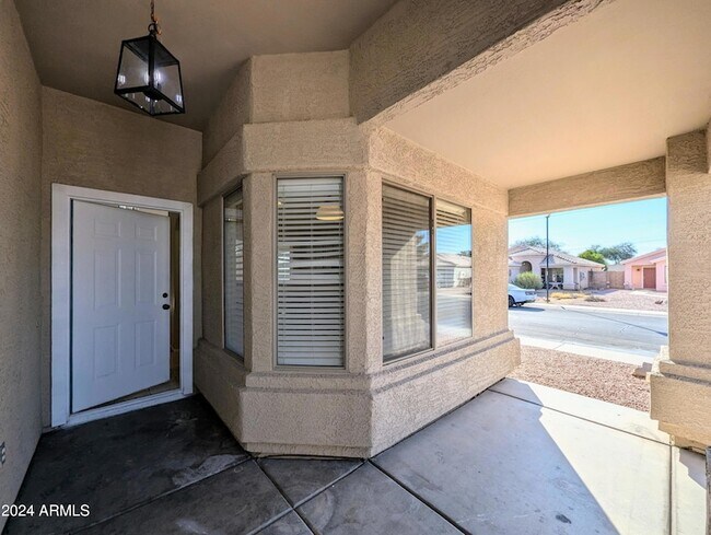 Building Photo - 7059 W Gardenia Ave