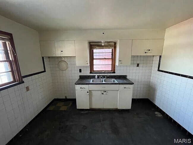 Building Photo - 5275 Alcott Ave
