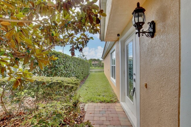 Building Photo - AGENT SHOWINGS ONLY! Gorgeous 2/2 + Den Mediterranean Villa with Waterfront Screened Patio and 2-...