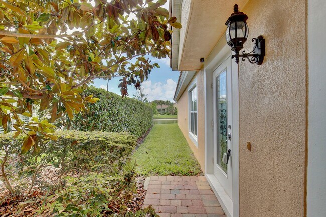 Building Photo - Gorgeous 2/2 + Den Mediterranean Villa with Waterfront Screened Patio and 2-Car Garage in the Pre...