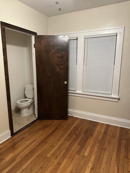 Front bedroom with 1/2 bath - 3517 Hildana Rd