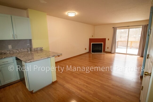 Building Photo - Forest Hills 3 Bed Townhome with Garage, Pond View and Some Utilities Included