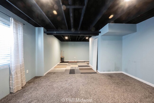 Building Photo - "Spacious 4-Bedroom Gem with Finished Base...