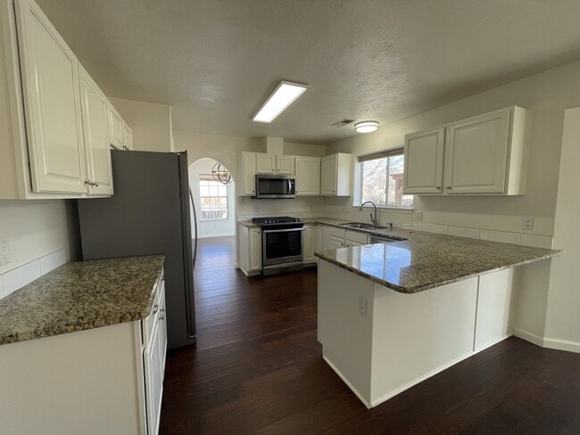 Building Photo - 10538 Olympic St NW