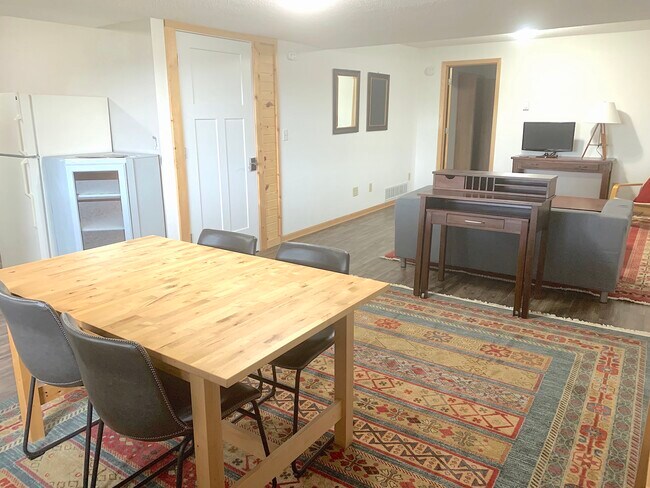 Dining room looking toward front door and bedroom - 317 N Wasson Ln