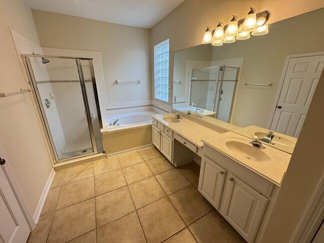 Building Photo - Spacious 4-Bedroom Home with Private Pool and Modern Comforts