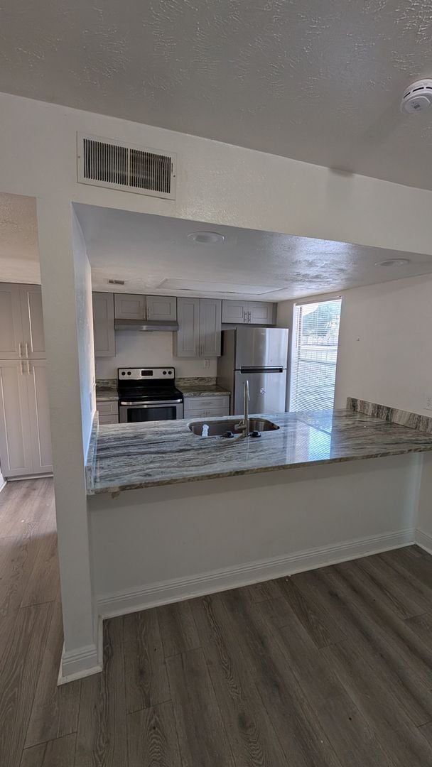 Building Photo - Two Bedrooms with terrace and fenced patio. Move in Special: Move before January 31sth for a secu...