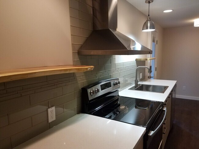 Glass tile backsplash and live-edge wooden shelves - 1610 SW Freeman St