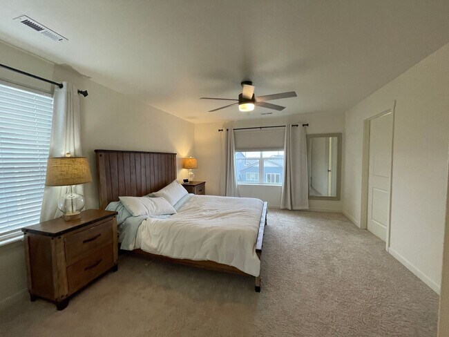 Building Photo - Live Lavishly in Harmony Ridge- Fully Furnished 5-Bedroom Dream Home with Backyard Oasis & Speake...