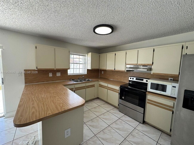 Building Photo - 6255 SW 129th Pl