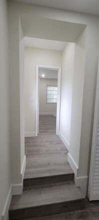 Hallway to bedroom with plenty of natural light and windows - 2385 SW 25th St