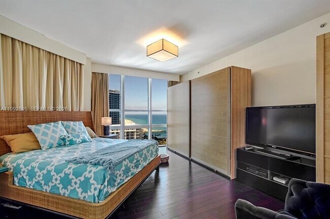 Building Photo - 10225 Collins Ave