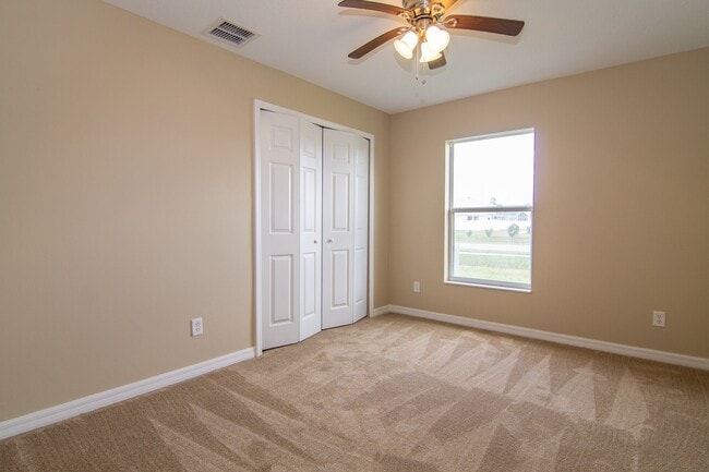 Building Photo - 4/3 Duplex Home in Poinciana Available, April 2026