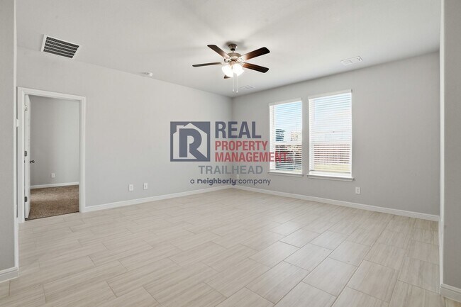 Building Photo - Inviting 4-Bedroom Layout with Flexible Living Areas