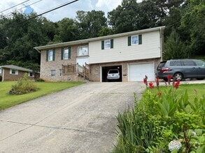 Building Photo - Spacious 4-Bedroom, 3-Bath Home in a Desir...