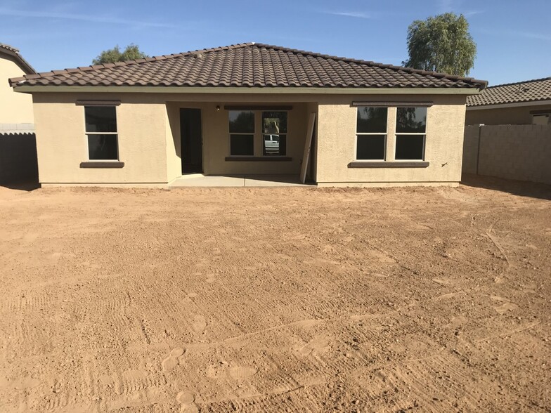 A large yard that will be landscaped by end of January - 1043 W Seminole Dr