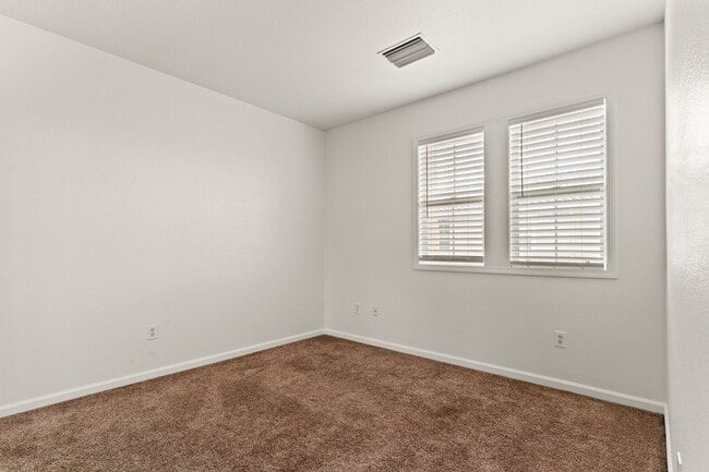 Building Photo - Spacious 3-Bedroom Dublin Townhome with Private Balcony & Fireplace