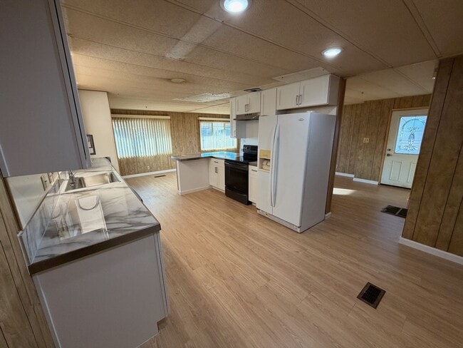 Building Photo - Retire in Style: Your Dream Home in one of...