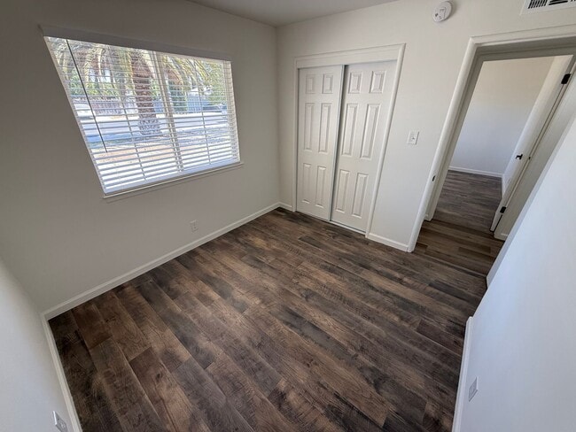 Building Photo - Updated Property with Large Front & Backyard