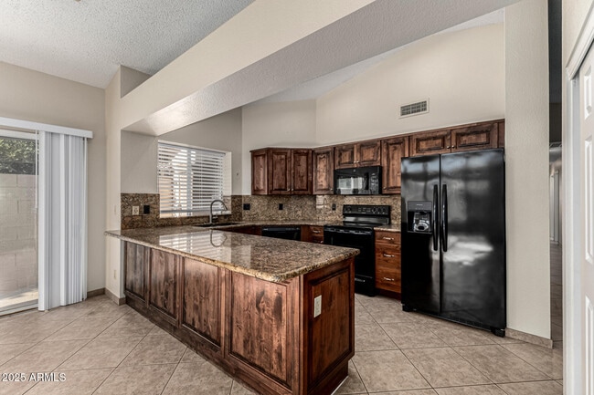 Building Photo - 8829 E Riviera Dr