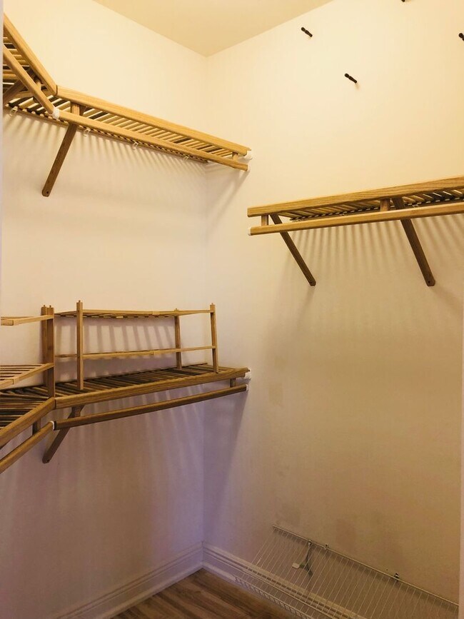 Building Photo - Experience Bell Tower Park. GATED ground floor 2 Bed 2 Bath Den 1 Car Garage Condo.