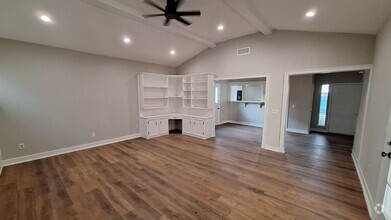 Building Photo - A spacious three-bedroom, two-bathroom ho...