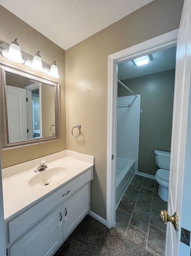Building Photo - SEE IT NOW: Spacious 4-Bed Home with Finis...