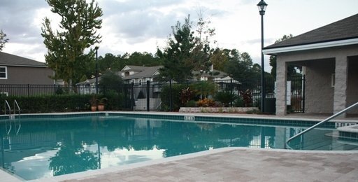 Building Photo - First-Floor 2BR/2BA Condo in Gated Nature’s Hideaway – Pool, Playground & Convenient Westside Loc...