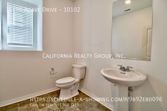 Building Photo - 34495 Agave Dr