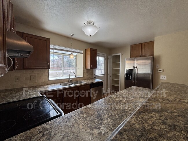 Building Photo - 9617 W Chatfield Ave
