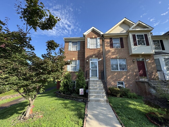 Primary Photo - Spacious End-Unit Townhome in a Prime Comm...