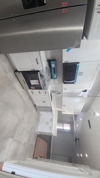 Building Photo - 6443 S Peoria St