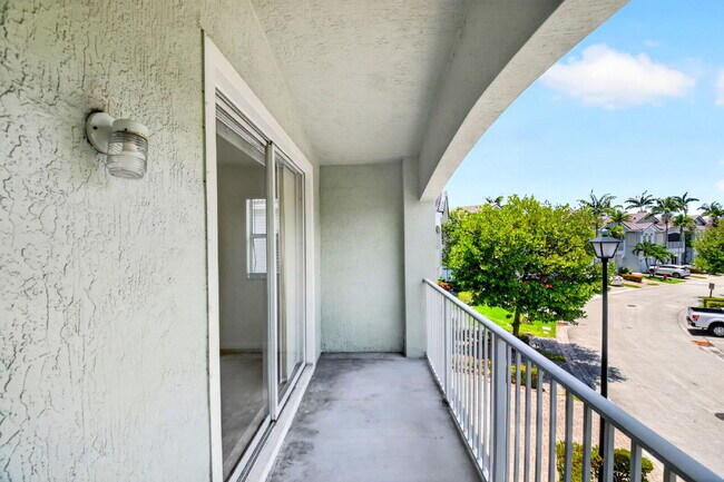 Building Photo - "Charming 2-Bed, 2-Bath Oasis in Riviera Beach – Your Perfect Retreat!"
