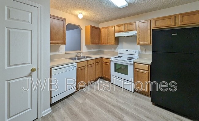 Building Photo - 8408 McGirts Village Ln