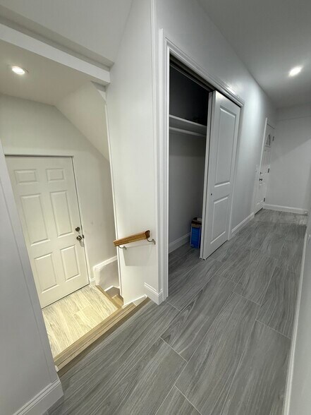 Unit 1 stairs and hall - 3334 208th St