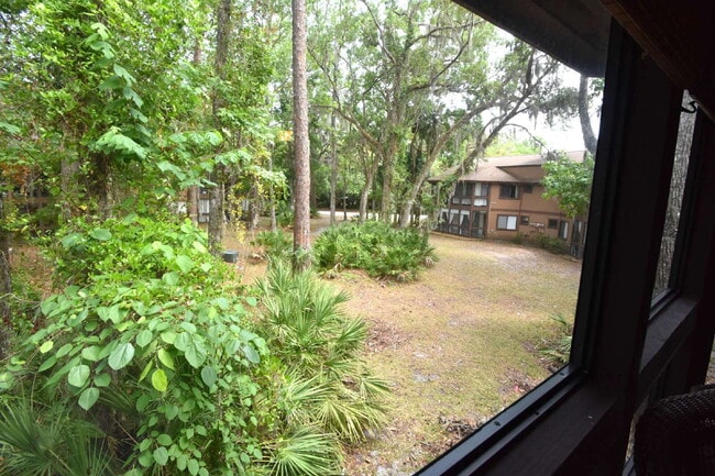 Building Photo - Second floor condo 2/1.5 located at the Fa...